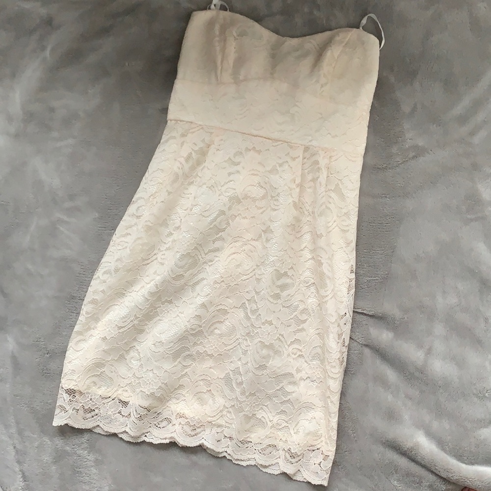Cream lace dress with a sweetheart neckline